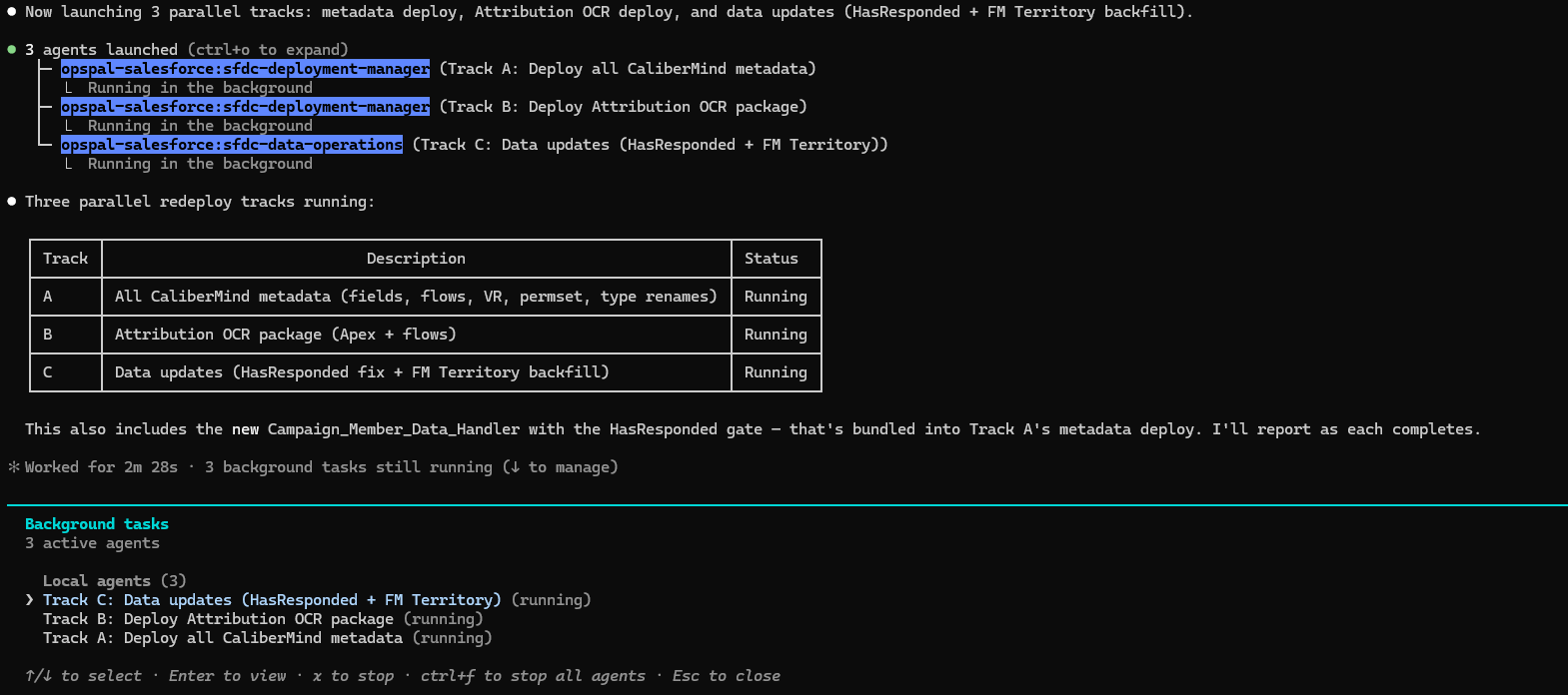 Background tasks panel showing 3 active agents with their track descriptions and running status